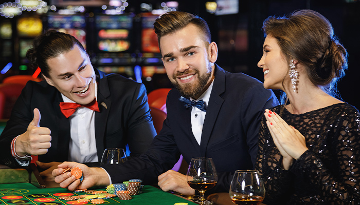 Two Guys and a Lady Playing Roulette