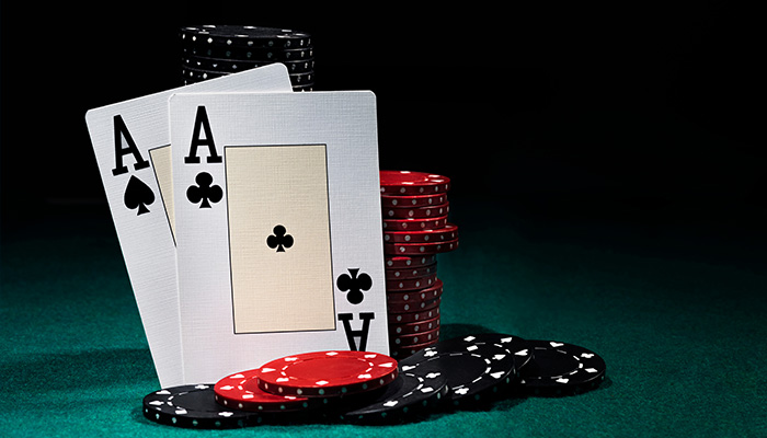 Poker chips and pair of Aces