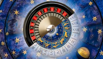 A half roulette wheel and zodiac wheel with stars.