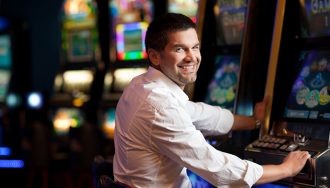 Gambler Playing Skill-Based Slot at Casino