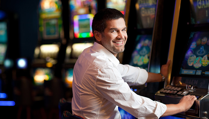 Gambler Playing Skill-Based Slot at Casino