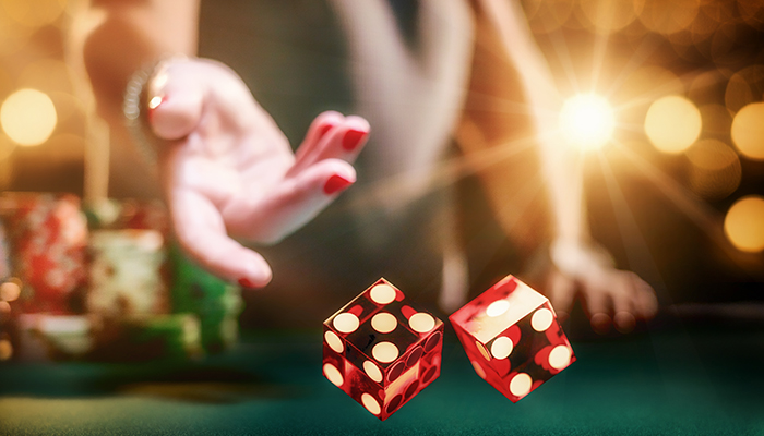 Dice being thrown on a table