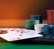 Computer keyboard with poker chips and cards